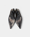 Brown leather pumps with a bow