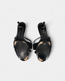 Rhinestone cross-shaped mules