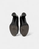 Black patent leather open-toe pumps