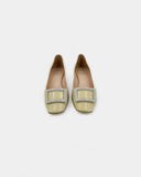 Cream-colored ballet flats with heels