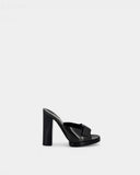 Mules en cuir noir à talon bloc