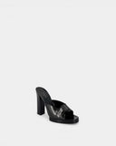 Mules en cuir noir à talon bloc