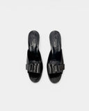 Mules en cuir noir à talon bloc
