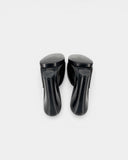 Mules en cuir noir à talon bloc