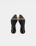 Mules en cuir noir à détail lacet