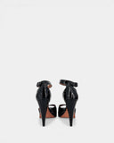 Sandales en cuir verni noir à bride cheville et plateforme