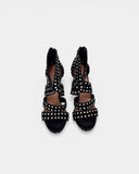 Sandales en cuir noir à clous et talon fin