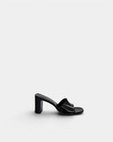 Mules à talons noires