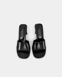 Mules à talons noires