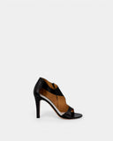 Sandales asymétriques à talons en cuir noir