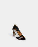 Sandales asymétriques à talons en cuir noir