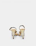 Sandales effet python beige à fleurs