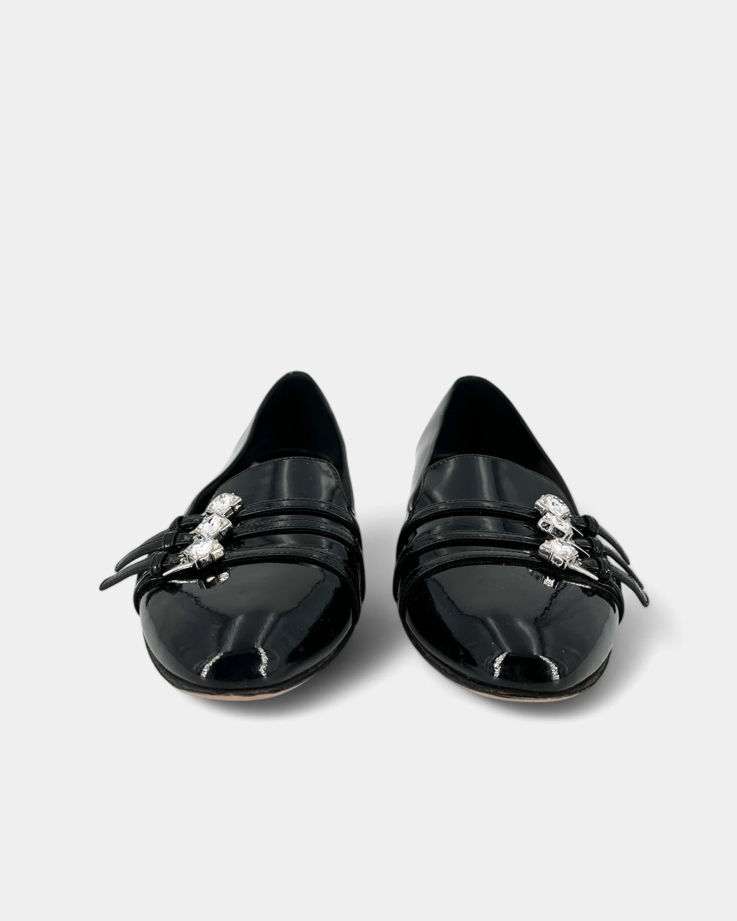 Black patent leather ballerinas