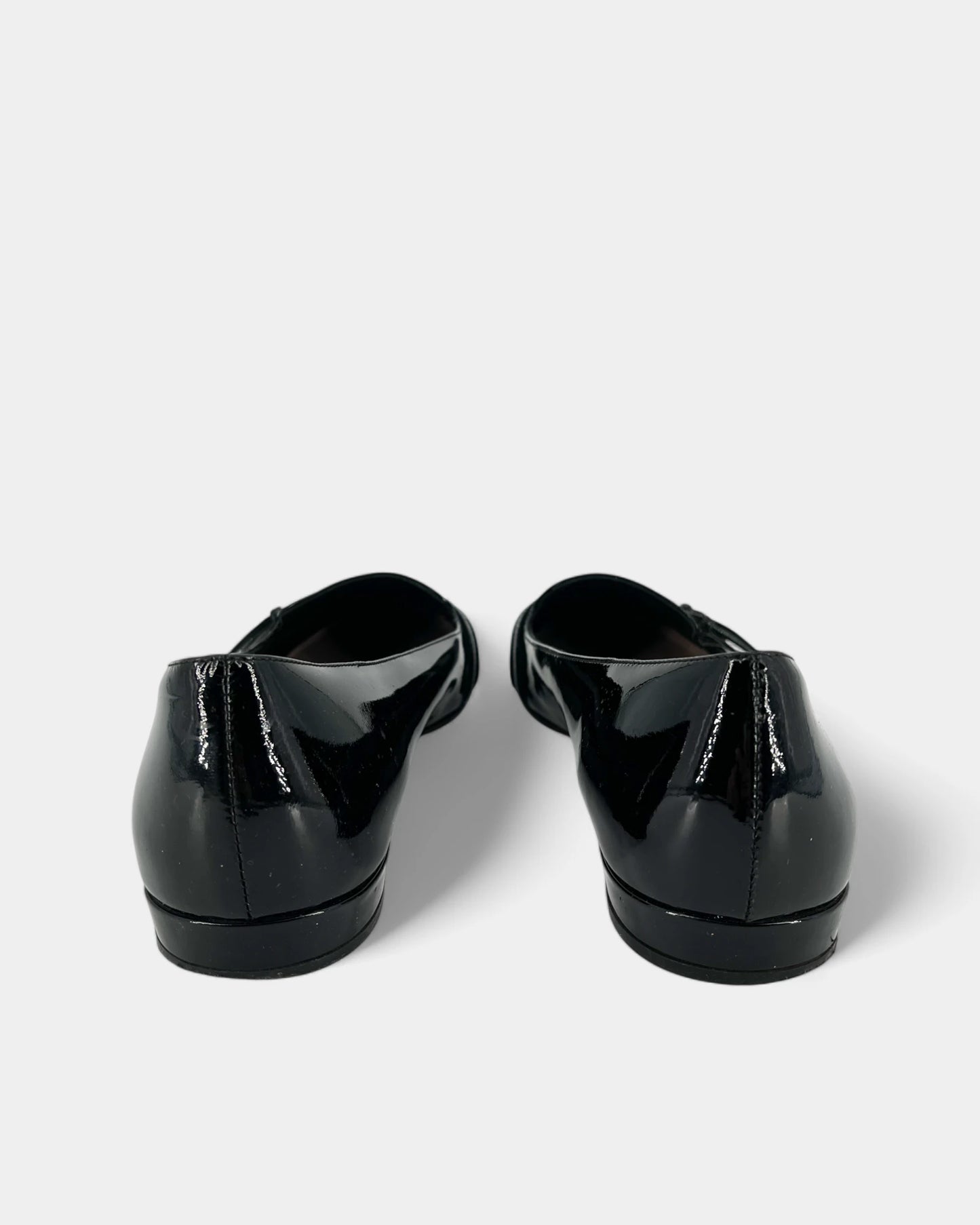 Black patent leather ballerinas