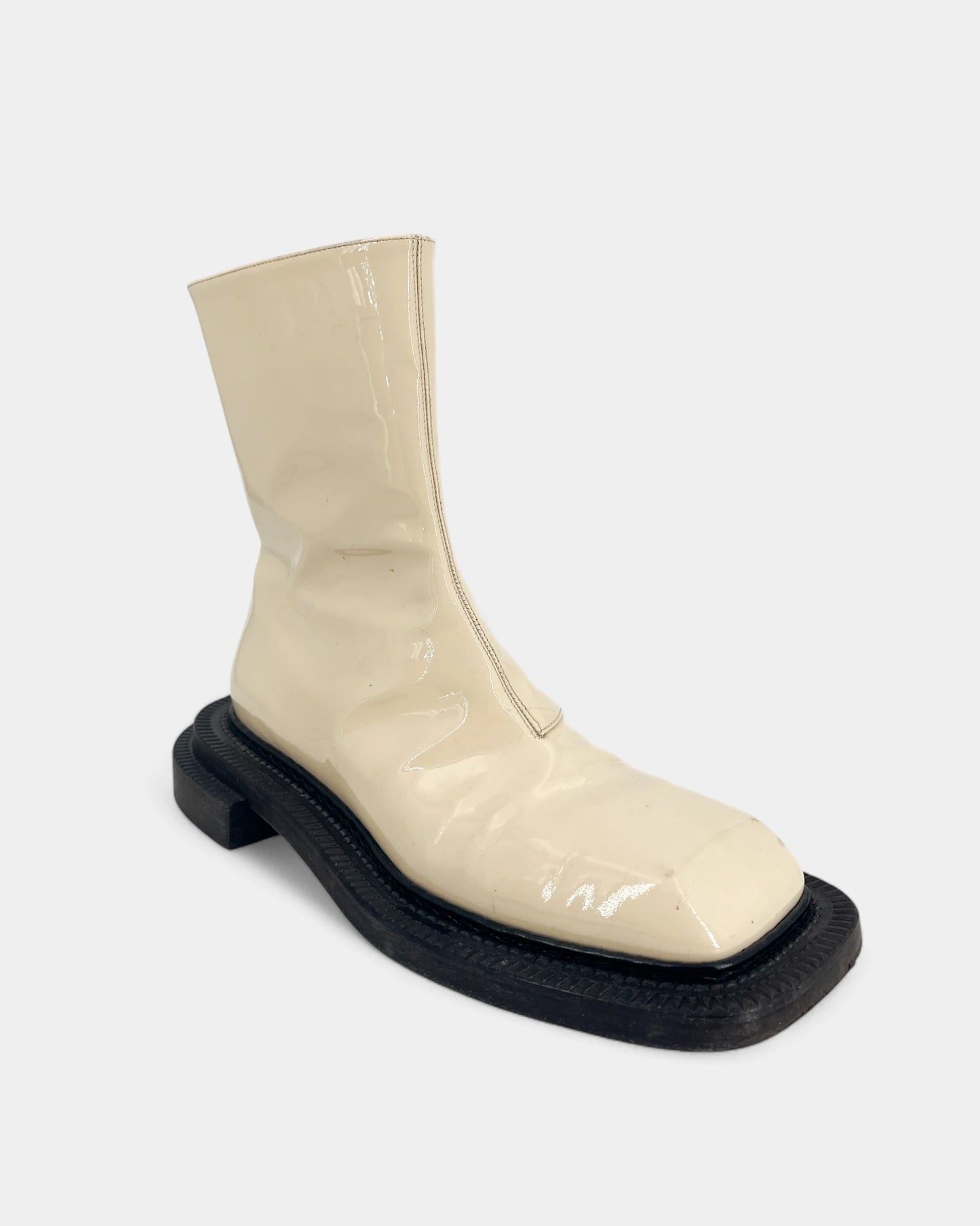 Cream boots with black soles