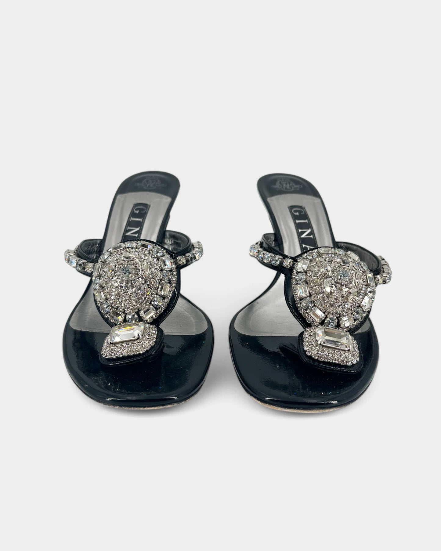 Leather mules with silver jewelry