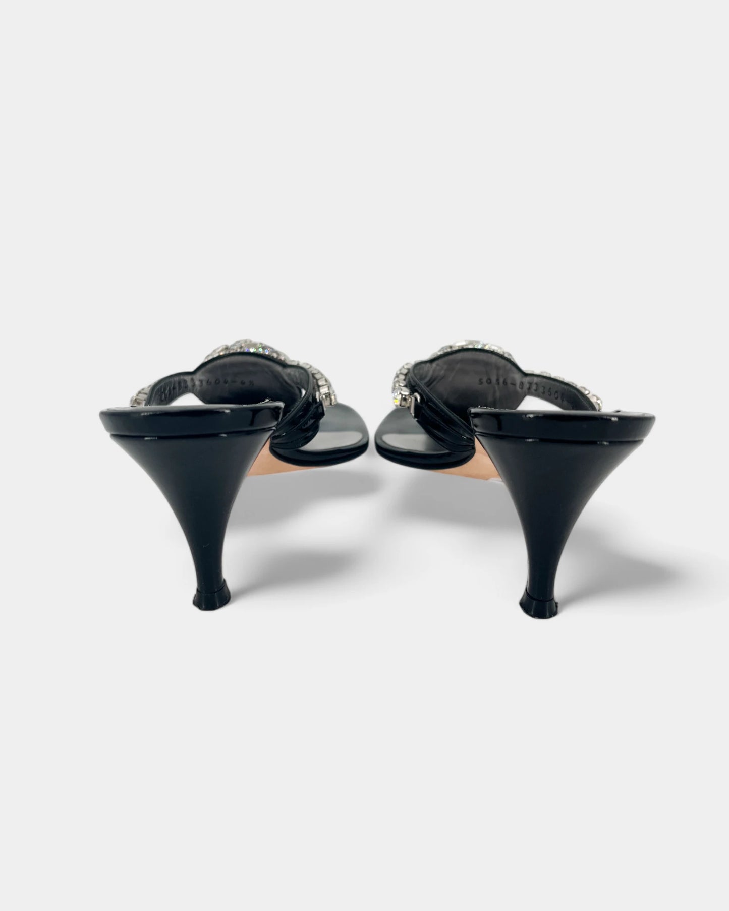 Leather mules with silver jewelry