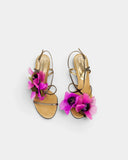 Sandales dorées à fleurs fuchsia