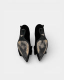 Black suede pumps with fabric bow