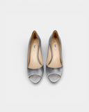 Grey leather pumps with plexi wedge heels