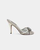 White heeled mules adorned with crystals