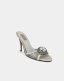 White heeled mules adorned with crystals