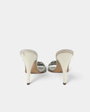 White heeled mules adorned with crystals