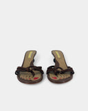 Brown flip-flops with sculptural heels