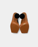 Brown and black mules