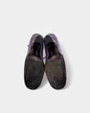 Purple pumps with a rounded toe