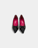 grey and black fabric pumps