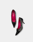 grey and black fabric pumps