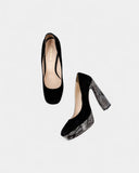 black suede pumps