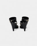 Black and gold sandals