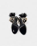 Sandales en cuir métallisé ornées de plumes