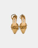 Beige suede slingbacks with bow