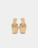 Beige mules with buckles