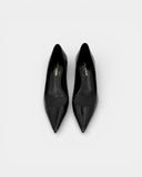 Black patent leather pumps