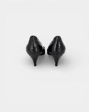 Black patent leather pumps