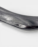 Black patent leather pumps