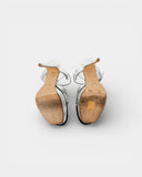 Sandales argentées à talon et plateforme