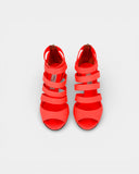 Orange strappy sandals with heel