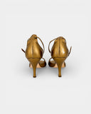 Gold leather ankle-strap pumps
