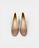 Nude two-tone patent leather pumps