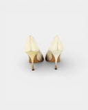 Nude two-tone patent leather pumps