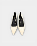 white patent leather pumps