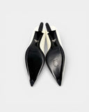 white patent leather pumps