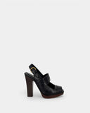 Sandales noires à talon bois et bride