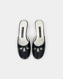 Mules noires à petit talon et nœud
