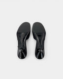 Mules noires à petit talon et nœud